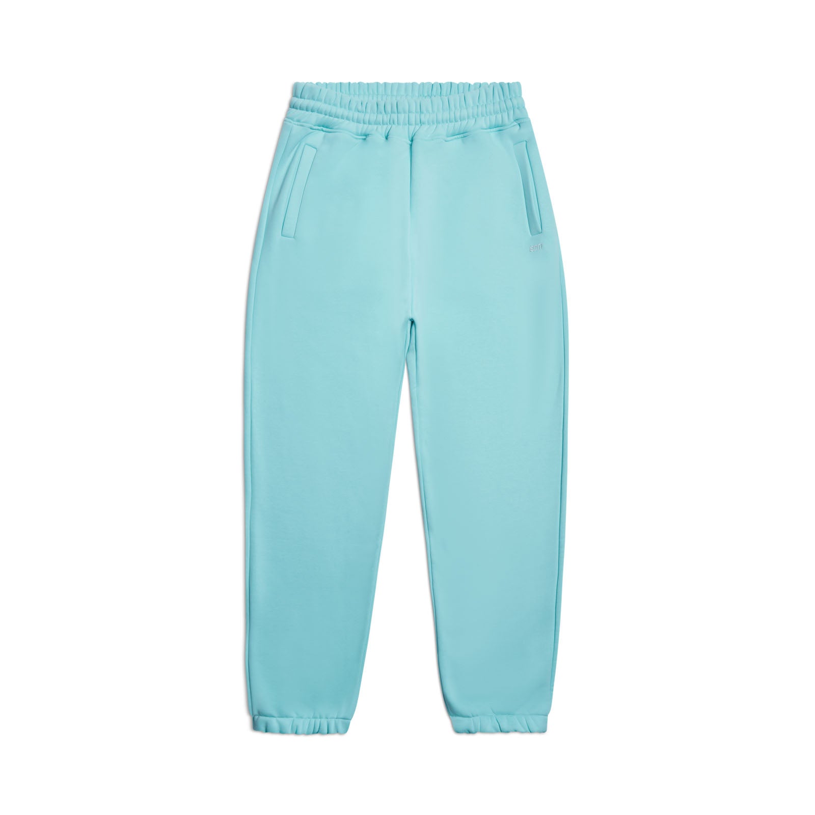 The 6PM CUFF JOGGER TURQUOISE features an elastic waistband, side pockets, and cuffed legs in a light blue hue, shown against a white background.