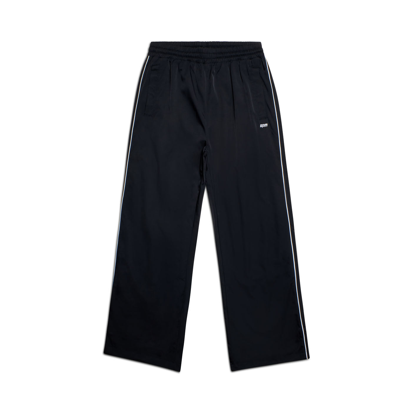 6PM+ NYLON PANTS OPEN LEG BLACK by 6PM: Black nylon track pants with a straight-leg fit, white side stripes, elastic waistband with drawstring, zipped pockets, and small white logo on the upper left thigh. Shown on a plain white background.