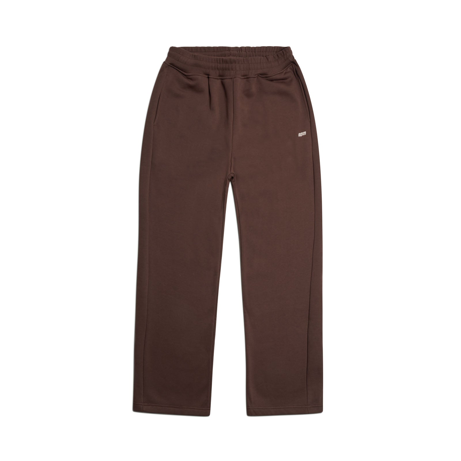 The OPEN LEG JOGGER CHOCOLATE BROWN features an elastic waistband, side pockets, relaxed straight-leg fit, and a small white logo on the left hip. Shown laid flat on a white background for a modern classic look.