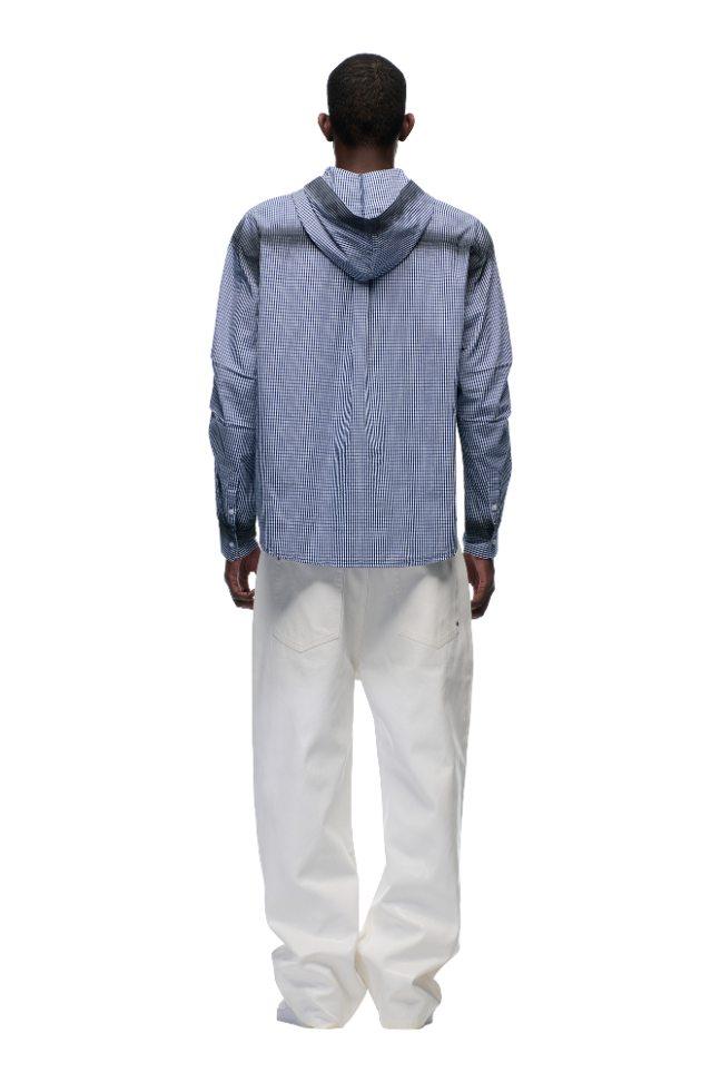 A person faces away, wearing the 6PM HOODED DRESS SHIRT DEEP SEA BLUE/WHITE and loose white pants, set against a plain white background.