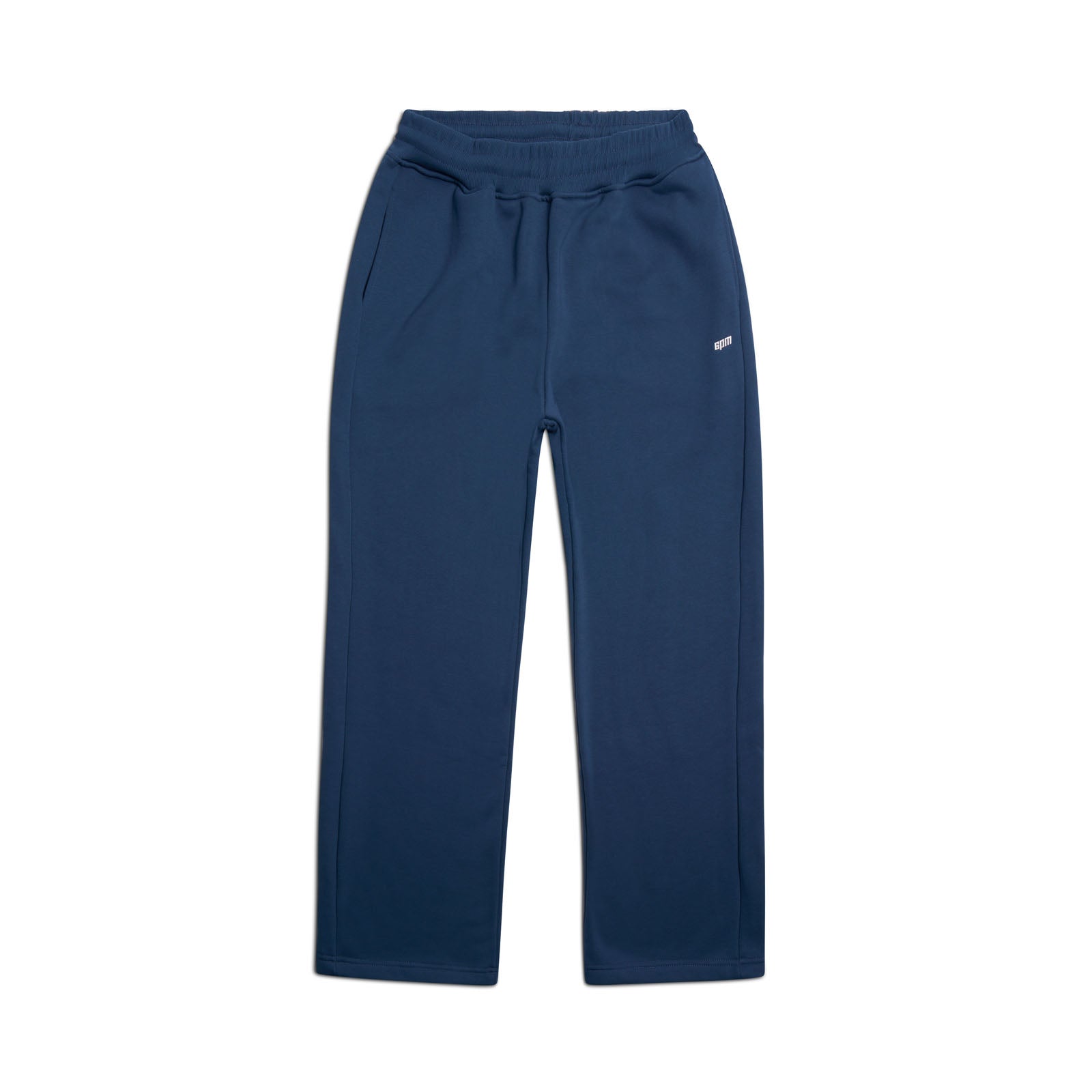 The 6PM OPEN LEG JOGGER NAVY features an elastic waistband, drawstring, side pockets, and a small white logo on the left thigh—delivering a modern classic look and ideal stacking length, shown against a white background.