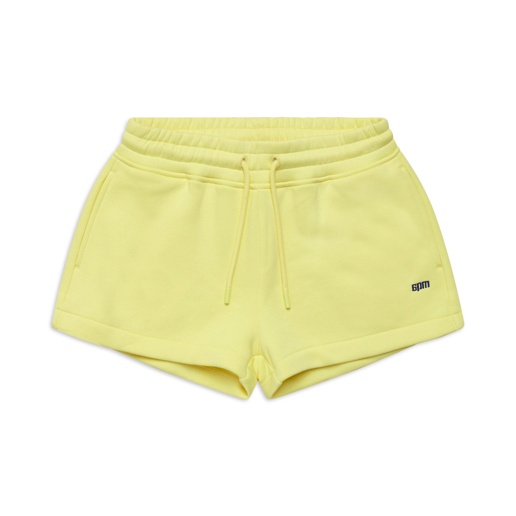 The 6PM WMNS SHORTS BUTTERCREAM are yellow athletic shorts featuring an elastic waistband, drawstring ties, side pockets, and a small black BPM logo on the lower left hem, shown against a white background.