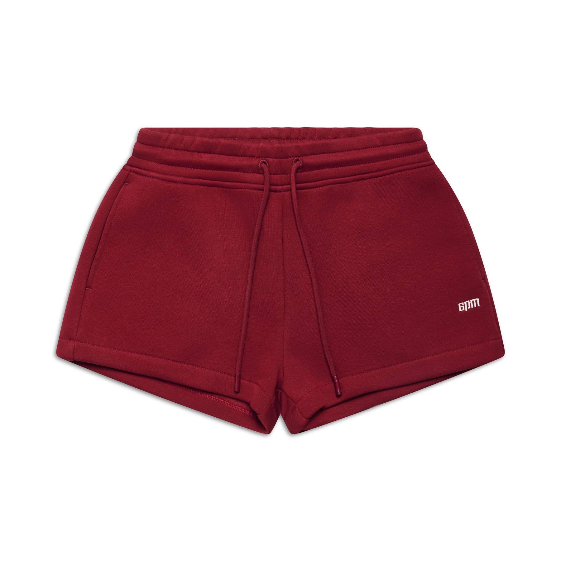 The 6PM WMNS SHORTS WINE RED feature an elastic waistband with drawstring, side pockets, and a small BPM logo on the left leg.
