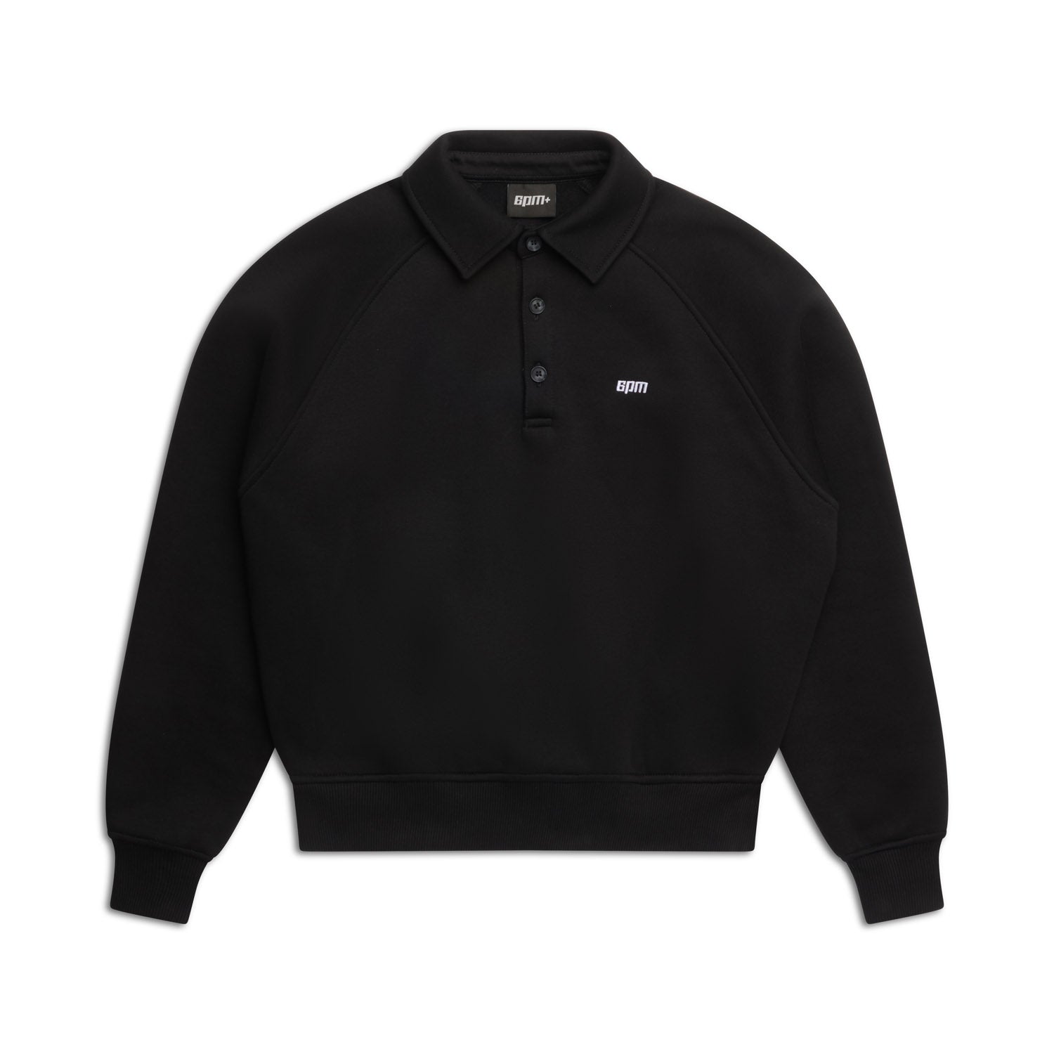 The WMNS POLO BLACK by 6PM is a black long-sleeve polo sweatshirt with a collar, three buttons, ribbed cuffs and hem, and small white 6PM text on the left chest. Displayed on a white background.