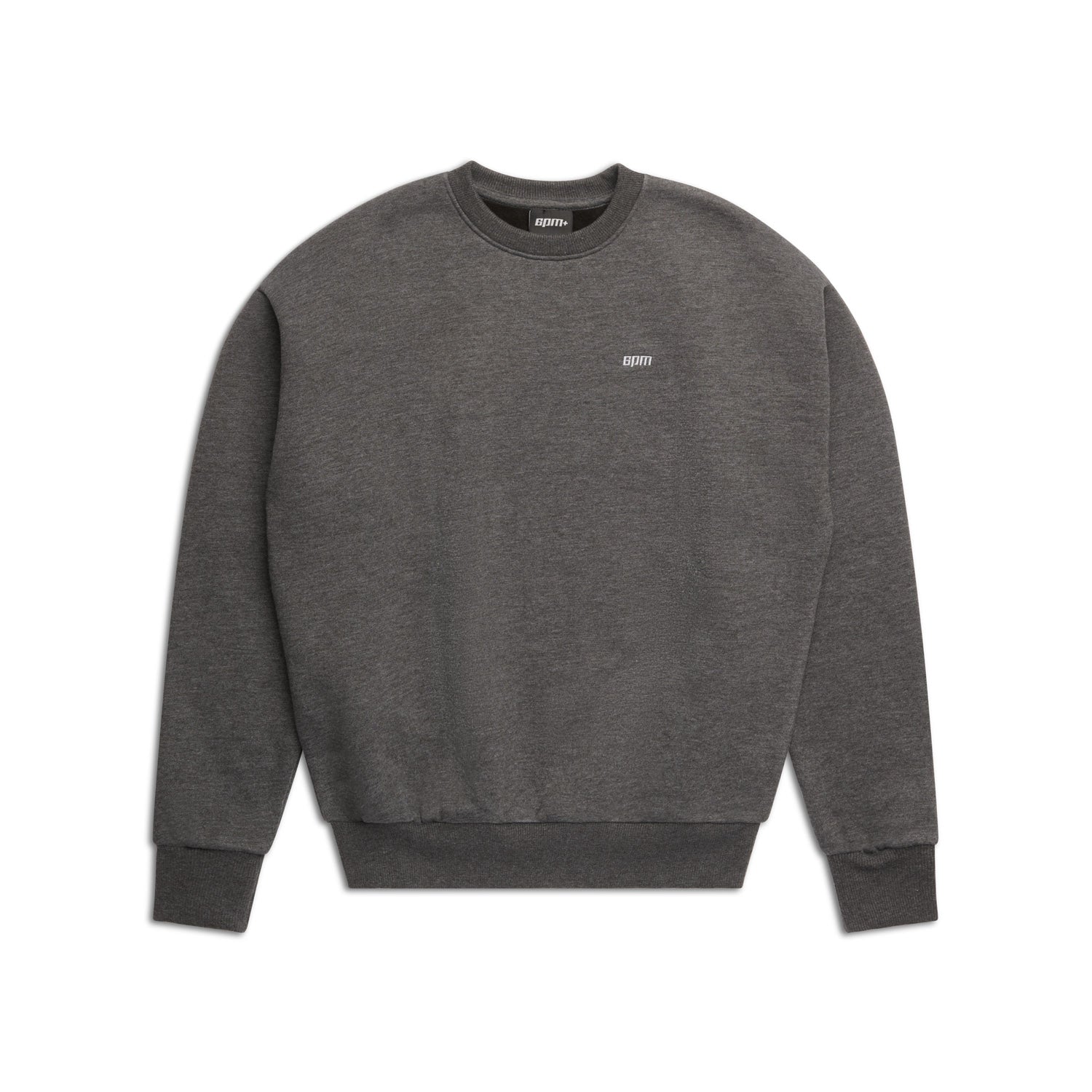 The 6PM CREWNECK DARK GREY MELANGE is a boxy fit sweatshirt with long sleeves, ribbed trims, and a small white logo on the upper left chest. It is shown laid flat on a white background.