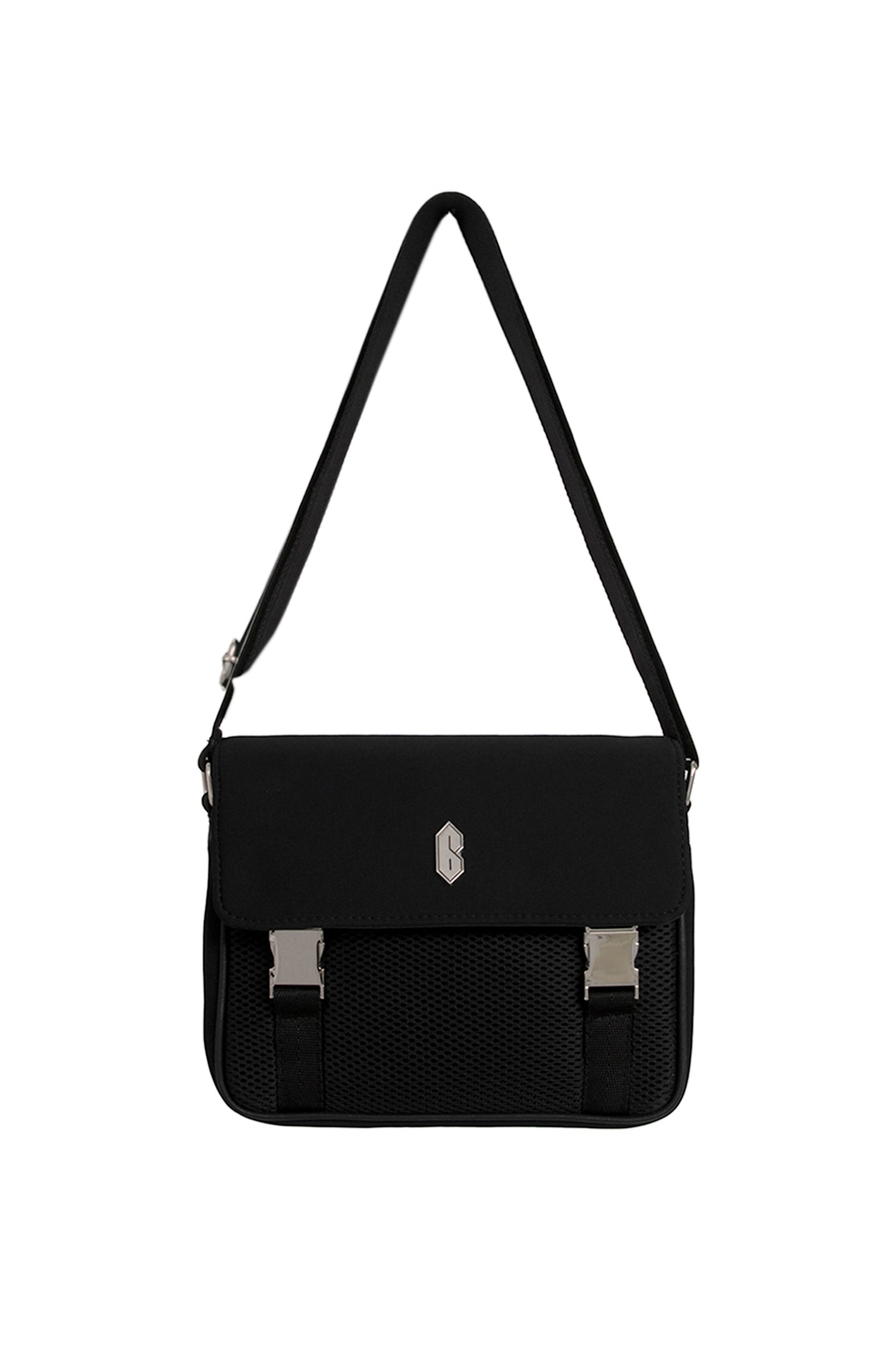 The 6PM NEOPRENE BAG BLACK features a flap closure, two silver buckles, a mesh front pocket, a central silver logo, an adjustable strap, and a sleek minimalist design.