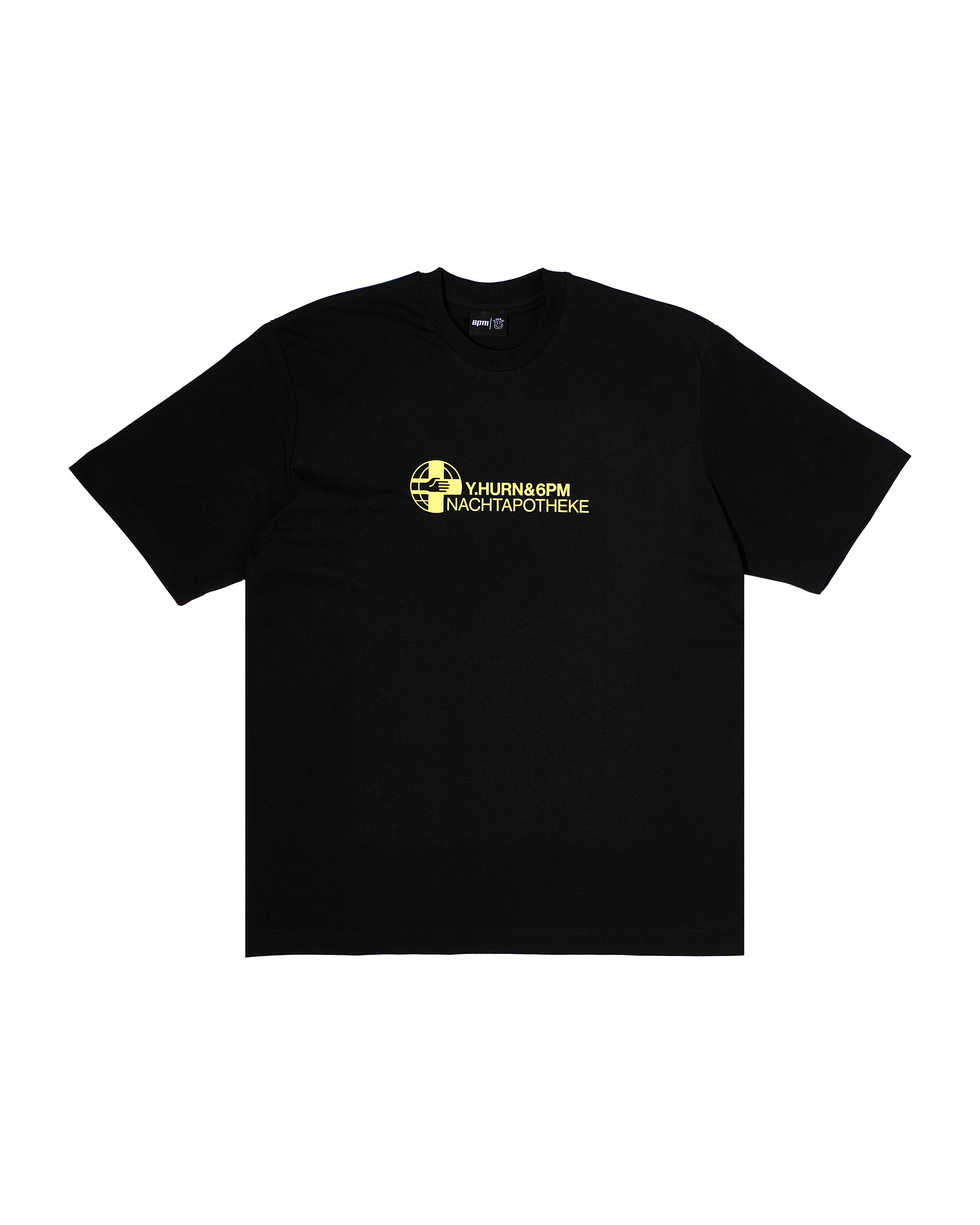 The 6PM NACHT AP T-SHIRT BLACK YELLOW is a plain black tee featuring a small yellow “YHUNG@6PM NACHTAPOTHEKE” graphic and a globe icon on the chest.
