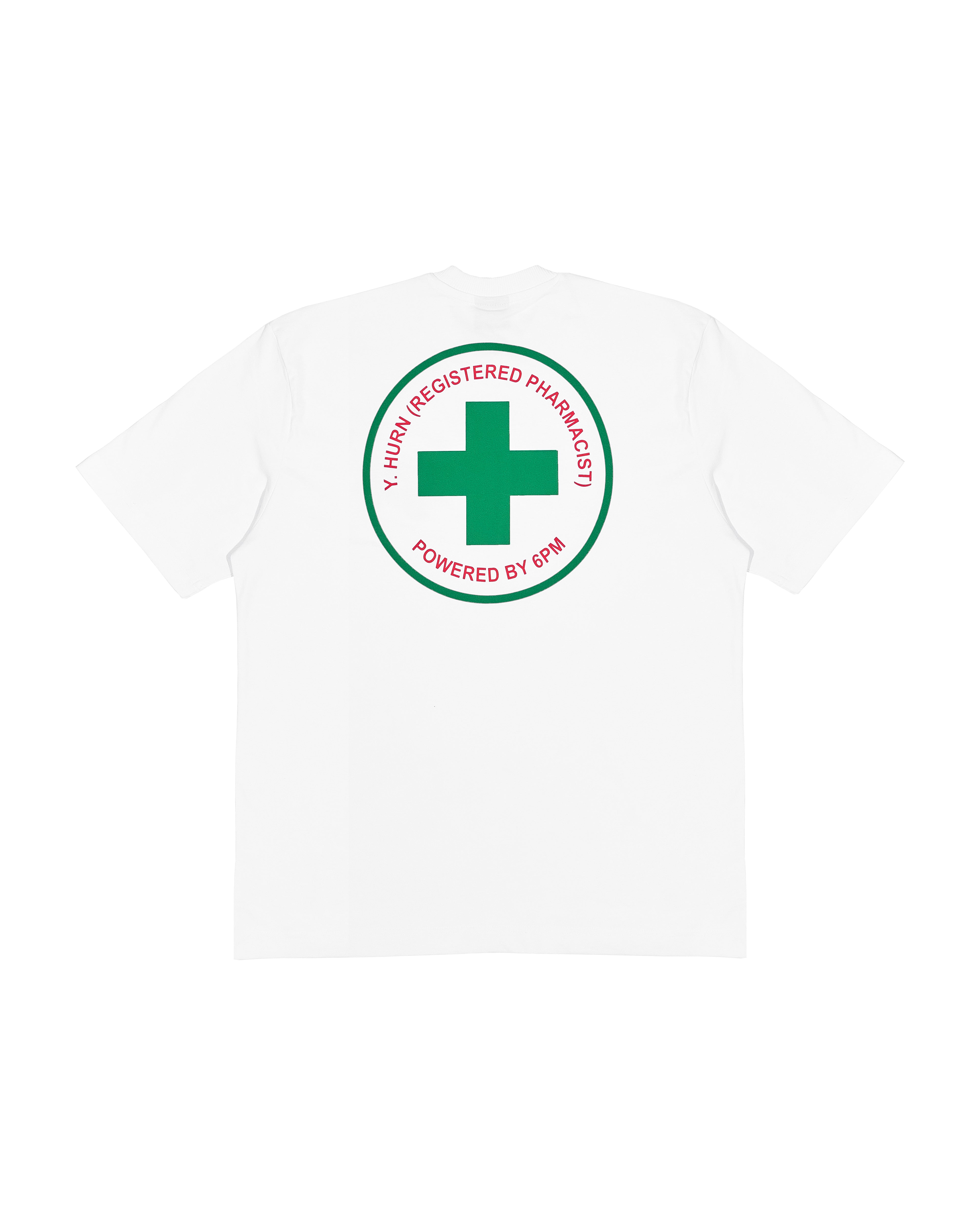 The YH 6PM T-SHIRT WHITE by 6PM features a large green medical cross in a circle on the back, with red text around it that reads “X HUH (REGISTERED PHARMACIST) POWERED BY 6PM.”.