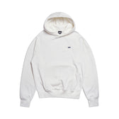 The 6PM HOODIE COCONUT WHITE features a plain white raglan design with long sleeves, a kangaroo pocket, and a small black logo on the left chest—perfect for everyday wear and shown on a white background.