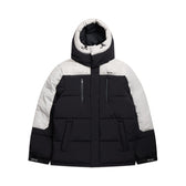 The COACH PUFFER COAT BLACK by 6PM features a hood, front zipper, two chest zip pockets, and two large hand pockets. Shown in black and white on a white background.
