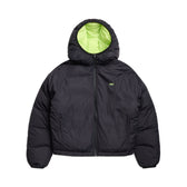 The 6PM REVERSIBLE PUFFER JACKET BLACK features a hood, front zipper, light green inner lining, and a small KITH logo on the left chest.