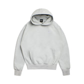 The HOODIE SMOKE GREY is a light gray, raglan-sleeved hoodie with a kangaroo pocket, long sleeves, and a small white chest logo, shown laid flat on a white background—ideal for everyday wear.