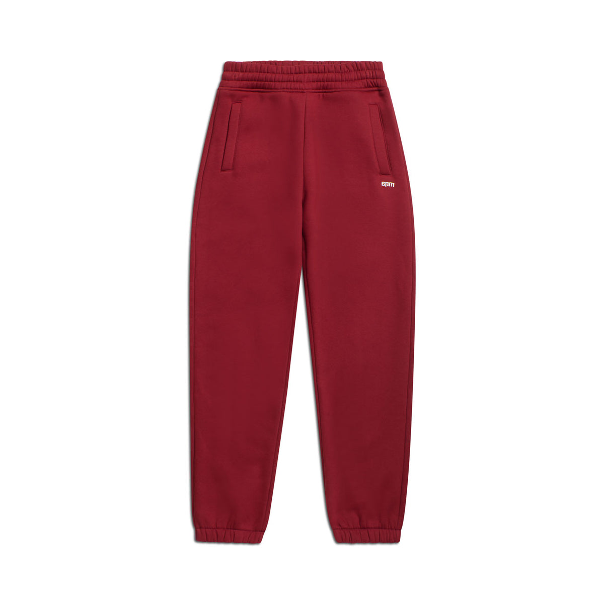 The 6PM CUFF JOGGER WINE RED features a classic fit, elastic waistband and cuffs, cuffed leg opening, two side pockets, and a small white logo on the left thigh, shown on a white background.