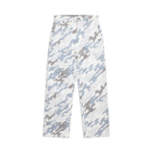 The 6PM DOT CAMO CHINO PANTS feature a straight-leg cut and a digital camo pattern in light blue, gray, and white, shown flat on a white background.