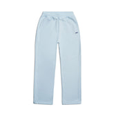 The 6PM OPEN LEG JOGGER ICE BLUE features an elastic waistband, side pockets, stacking length, and a small embroidered logo on the left thigh—a modern classic ideal for any wardrobe.