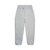 The 6PM CUFF JOGGER GREY MELANGE features an elastic waistband with drawstring, cuffed ankles, side pockets, and a classic fit, shown laid flat on a white background.