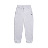 The 6PM CUFF JOGGER LIGHT GREY features an elastic waistband with drawstring, two side pockets, and cuffed ankle openings, shown laid flat on a white background.