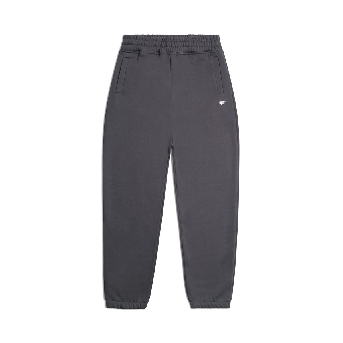 The 6PM CUFF JOGGER ANTHRACITE sweatpants in dark gray feature an elastic waistband, cuffed legs, two front pockets, and a small white logo near the left pocket, shown flat on a white background.