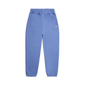 The 6PM CUFF JOGGER PERSIAN BLUE features a classic fit, elastic waistband, side pockets, and cuffed ankle openings, shown on a white background.