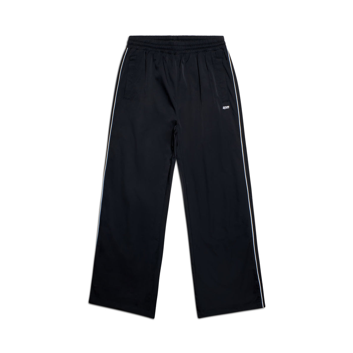 6PM+ NYLON PANTS OPEN LEG BLACK by 6PM: Black nylon track pants with a straight-leg fit, white side stripes, elastic waistband with drawstring, zipped pockets, and small white logo on the upper left thigh. Shown on a plain white background.