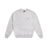 The 6PM CREWNECK LIGHT GREY is a long-sleeve sweatshirt with ribbed trims and a small black logo on the left chest, shown laid flat on a white background.