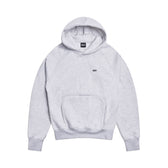 The 6PM HOODIE LIGHT GREY features raglan long sleeves, a front kangaroo pocket, ribbed cuffs and hem, and a small black embroidered logo on the left chest. Perfect for everyday wear. Shown laid flat on a white background.