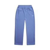 The 6PM OPEN LEG JOGGER PERSIAN BLUE features an elastic waistband, two side pockets, open leg design, and a small white logo on the left upper thigh, shown laid flat on a white background.