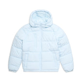The 6PM PUFFER JACKET ICE BLUE features a hood, front zipper, and two side pockets, displayed against a white background.