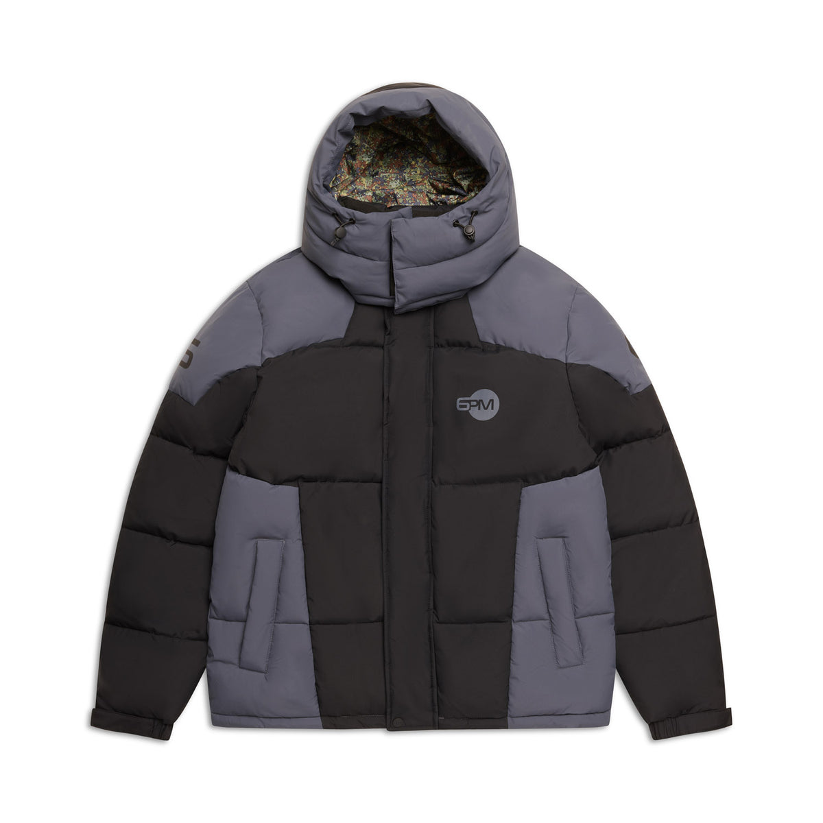 The 6PM COLOUR BLOCKING PUFFER BLACK/ANTHRACITE is a gray and black hooded jacket with a front zipper, patterned hood lining, logo patch on the left chest, color-block design, and insulated sections.