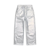The 6PM WAX COATED DENIM SILVER SURFER pants are high-waisted, straight-leg with a metallic silver finish, front and back pockets, belt loops, and a button-and-zip closure, shown flat on a white background.
