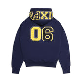 The 6PM COLLEGE LETTER HOODIE MIDNIGHT BLUE features bold yellow 06 numbers on the back and "XPINIX" in yellow text across the hood.