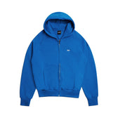 The 6PM ZIP HOODIE PRINCESS BLUE features a clean finish, front zipper, two large front pockets, ribbed cuffs and hem, and a small white logo on the left chest, shown against a white background.