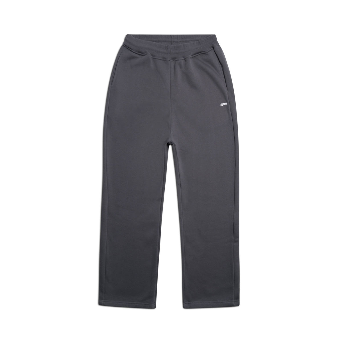 The 6PM OPEN LEG JOGGER ANTHRACITE is a modern classic straight-leg sweatpant in dark gray with an elastic waistband and two side pockets, designed for a stacking length look, shown laid flat on a white background.
