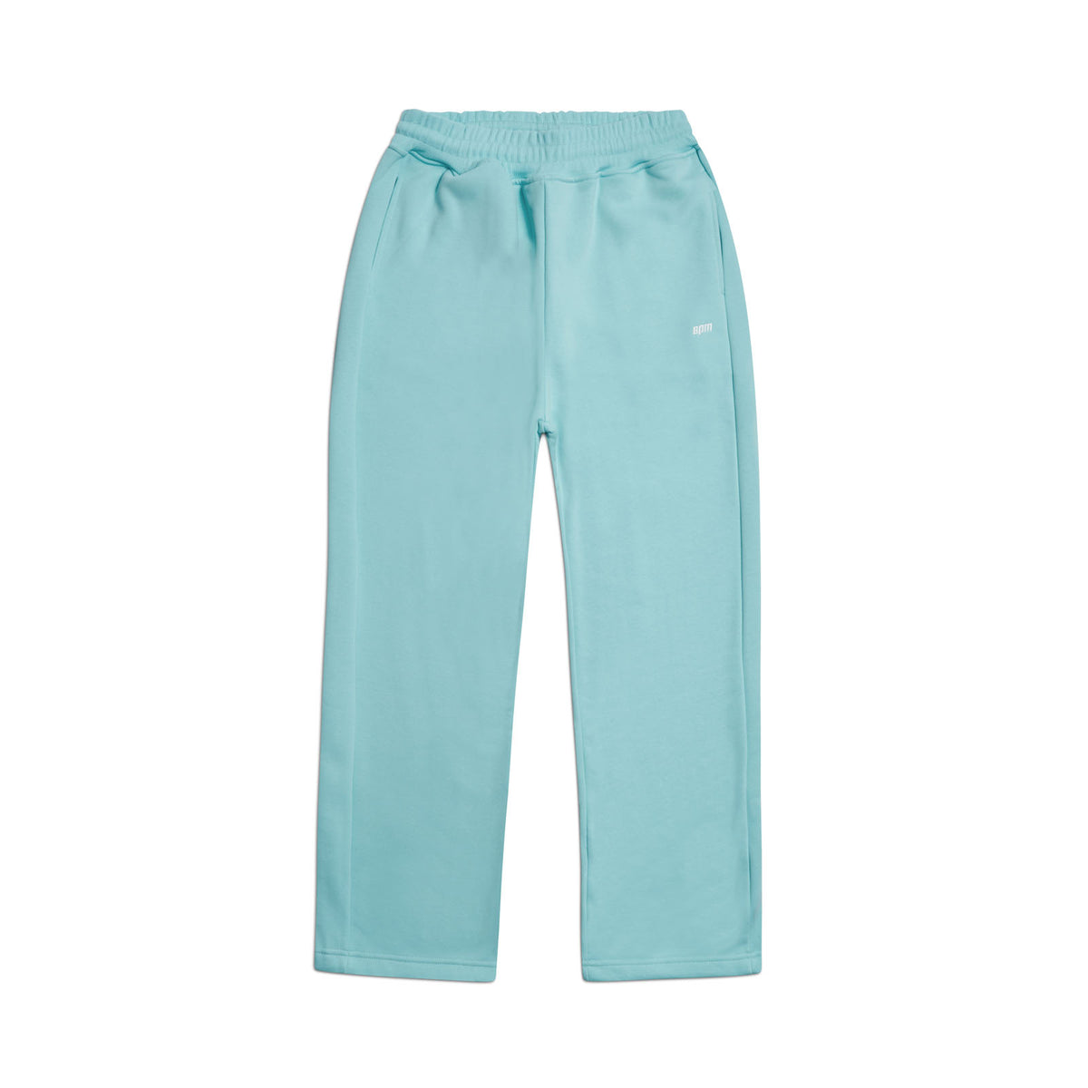 The 6PM OPEN LEG JOGGER TURQUOISE features an elastic waistband, straight open legs, and side pockets for a modern classic look. Shown laid flat on a white background.