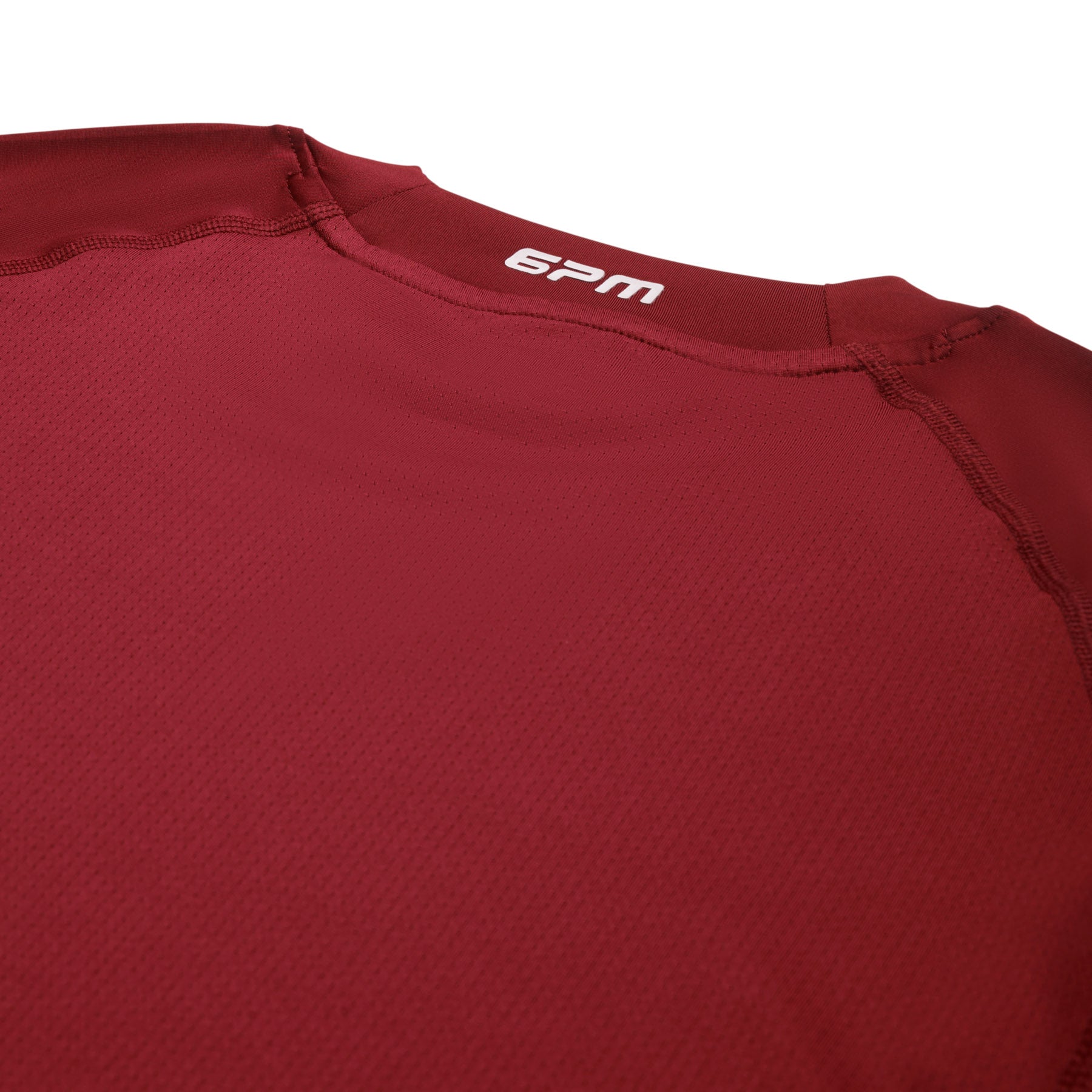 Close-up of the back neckline on the 6PM SPORTS T-SHIRT WINE RED, featuring visible stitching and the white 6PM branding printed inside the collar.