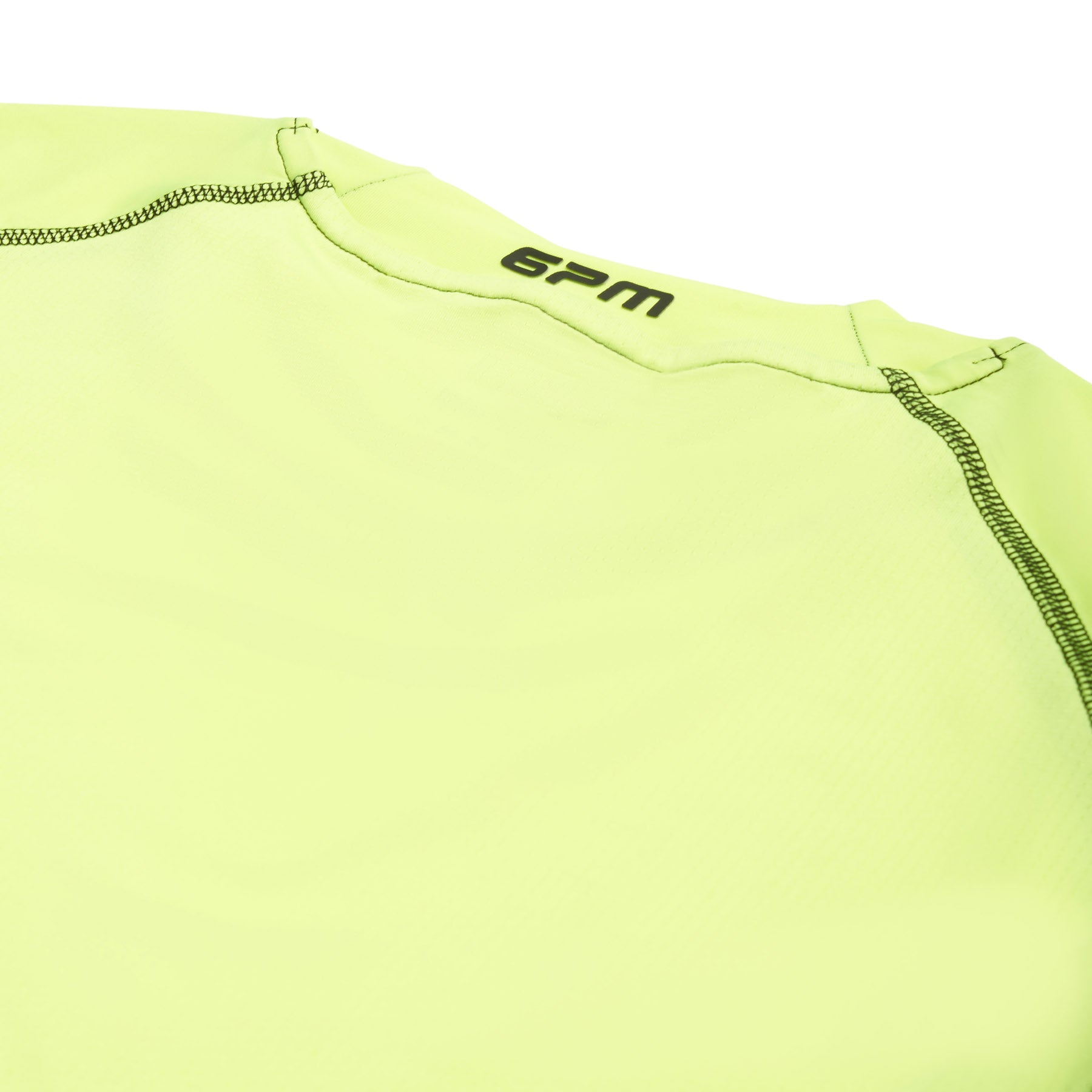 Close-up of the upper back of the 6PM SPORTS T-SHIRT NEON YELLOW featuring black stitching and "6PM" branding near the collar.