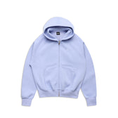 The 6PM ZIP HOODIE SOFT VIOLET is a light purple zip-up hoodie featuring a clean finish, hood, long sleeves, front pockets, and a small white logo on the left chest, shown on a plain white background.