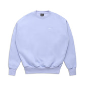 The 6PM CREWNECK SOFT VIOLET is a light purple sweatshirt with long sleeves, ribbed cuffs and hem, plus a small white left-chest logo. It features ribbed trims and is shown laid flat on a white background.