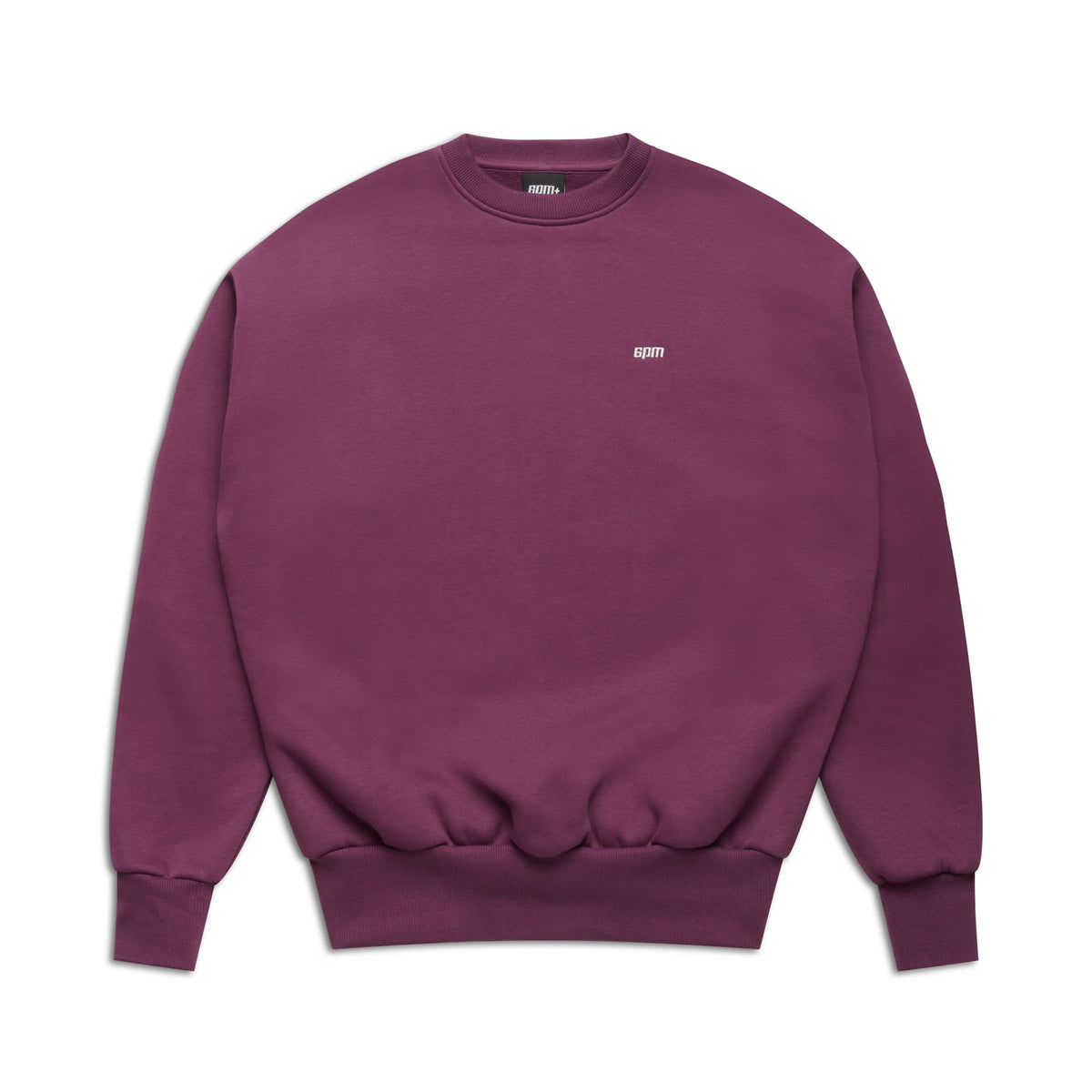 The 6PM CREWNECK PLUM sweatshirt features a plain purple design, ribbed trims, and a small white logo on the left chest, shown against a white background.