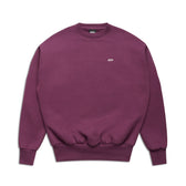 The 6PM CREWNECK PLUM sweatshirt features a plain purple design, ribbed trims, and a small white logo on the left chest, shown against a white background.