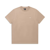 The 6PM T-SHIRT REGULAR FIT MOCCA CREAM is a beige crew neck short-sleeve tee with a small white logo on the left chest, offering an effortlessly stylish essential, shown laid flat against a white background.