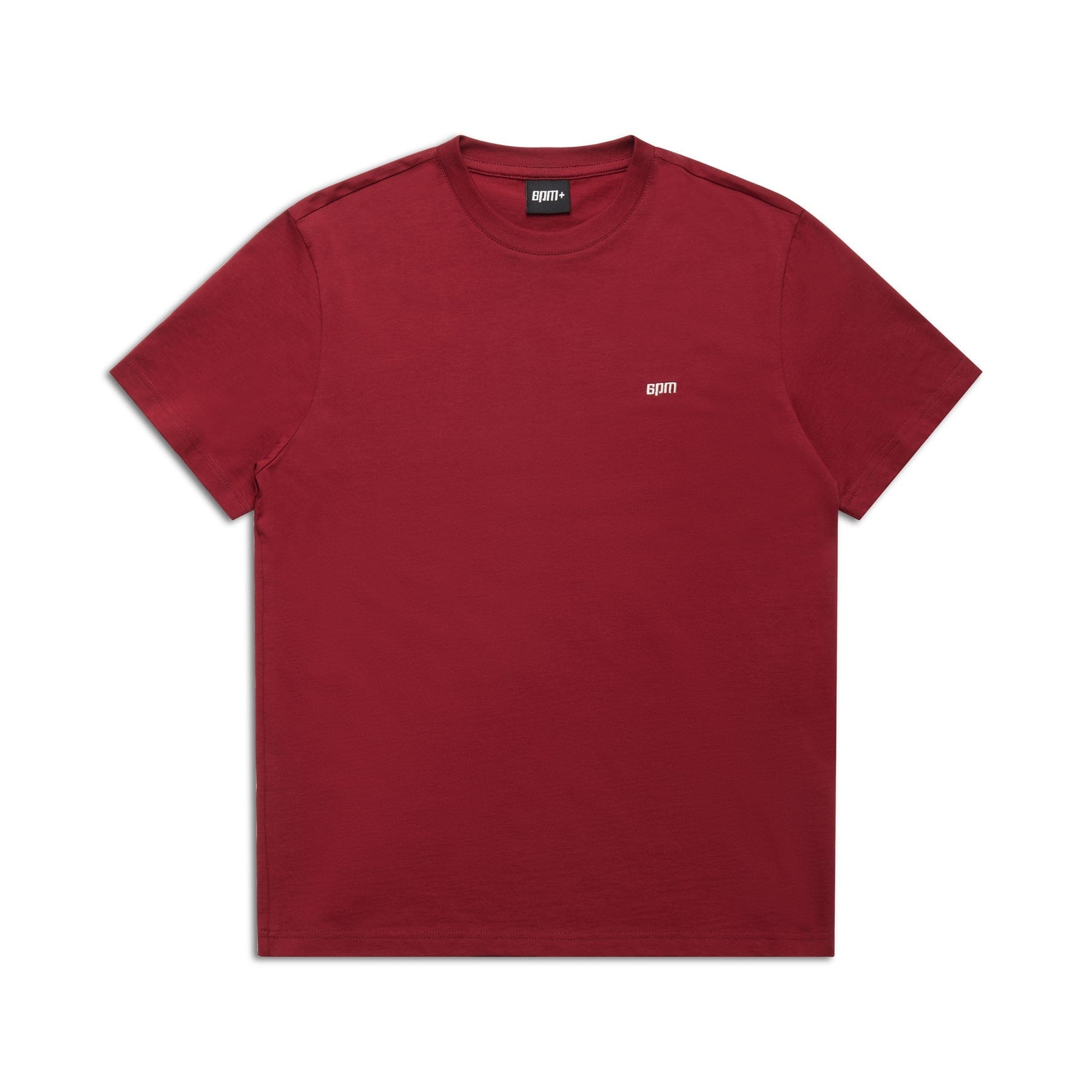 The 6PM T-SHIRT REGULAR FIT WINE RED features short sleeves and a small white logo on the left chest, shown laid flat on a white background—ideal for showcasing effortless style.