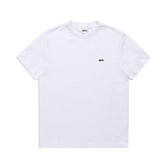 The 6PM T-SHIRT REGULAR FIT WHITE is a plain white short-sleeve tee with a small black logo on the left chest, ideal for effortless style. Displayed on a white background.