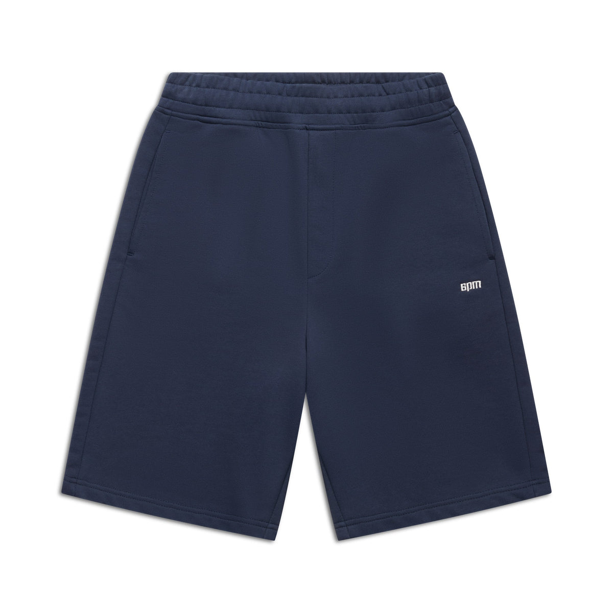 6PM+ SHORTS NAVY by 6PM: navy blue athletic shorts with a relaxed fit, elastic waistband, drawstring waist, side pockets, and a small white 6PM logo on the left leg, shown flat on a white background.