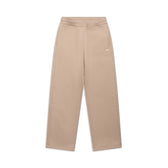 The OPEN LEG JOGGER MOCCA CREAM by 6PM: beige high-waisted wide-leg pants with stacking length, side pockets, and a subtle white logo on the left thigh—modern style shown on a white background.