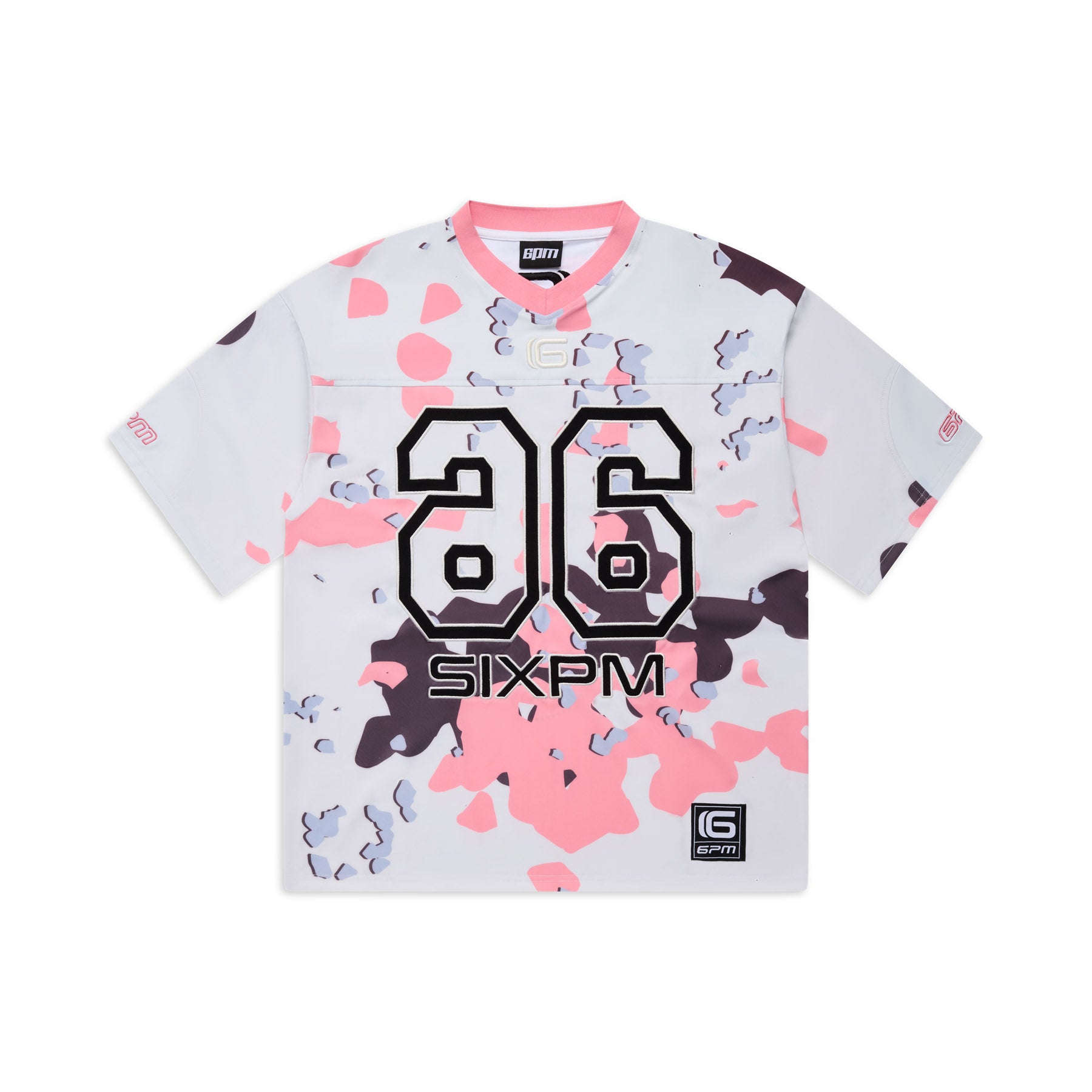 The CAMO JERSEY FLAMINGO by 6PM is a short-sleeved sports jersey with pink, white, black, and purple camo print, bold black 86 on the front, SIXPM text below the numbers, and logos on the collar and lower hem.
