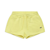 The 6PM WMNS SHORTS BUTTERCREAM are yellow athletic shorts featuring an elastic waistband, drawstring ties, side pockets, and a small black BPM logo on the lower left hem, shown against a white background.