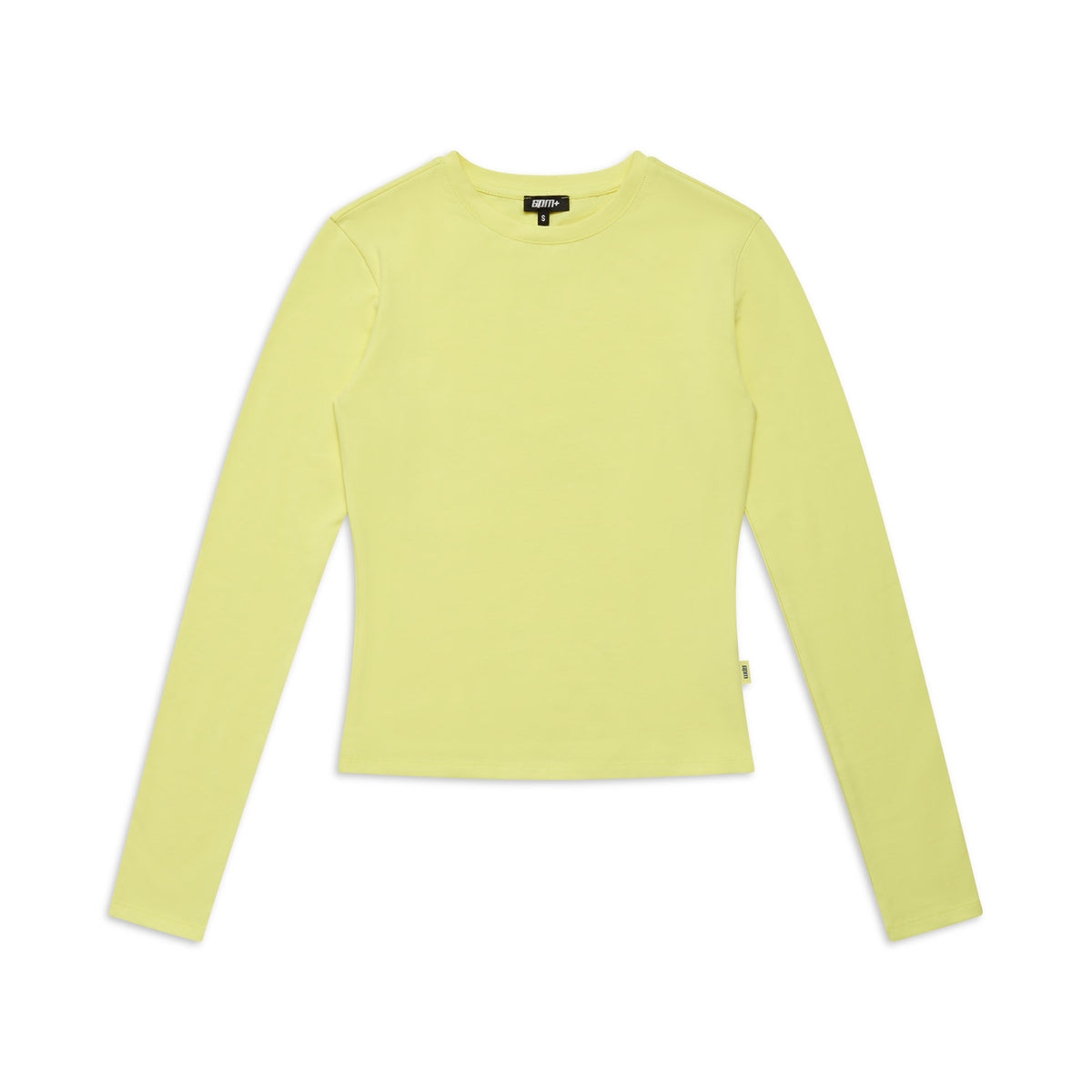 The 6PM WMNS LONGSLEEVE BUTTERCREAM is a plain, light yellow women’s top with long sleeves and a crew neck, shown laid flat on a white background.