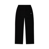 The 6PM WMNS OPEN LEG BLACK sweatpants feature a straight-leg cut, elastic waistband with adjustable drawstrings, and a small white embroidered logo on the left thigh, shown flat against a white background.