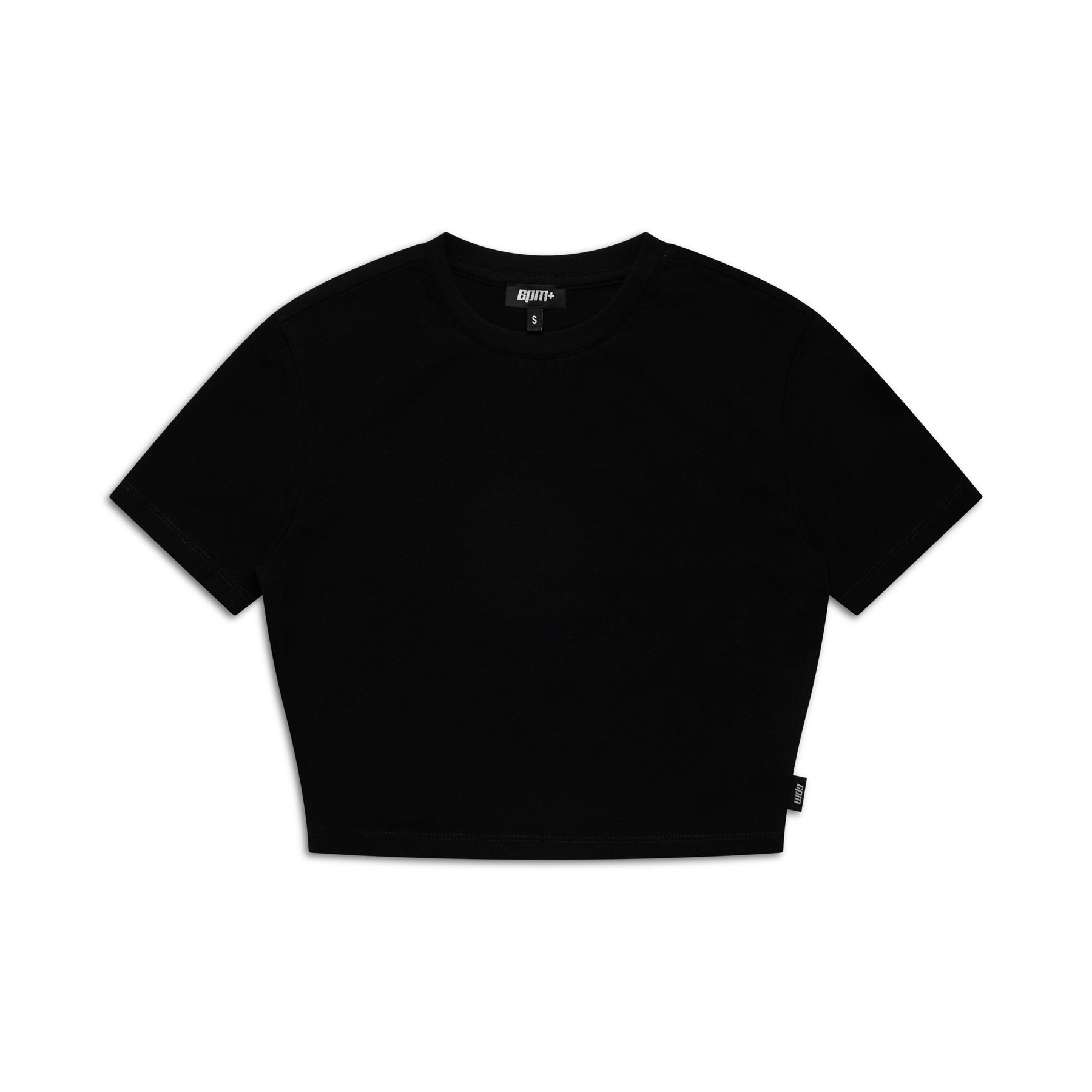 The 6PM WMNS CROPPED T-SHIRT BLACK is a plain, short-sleeve black cropped tee, shown flat on a white background with a small fabric tag at the hem and an inner collar brand label.